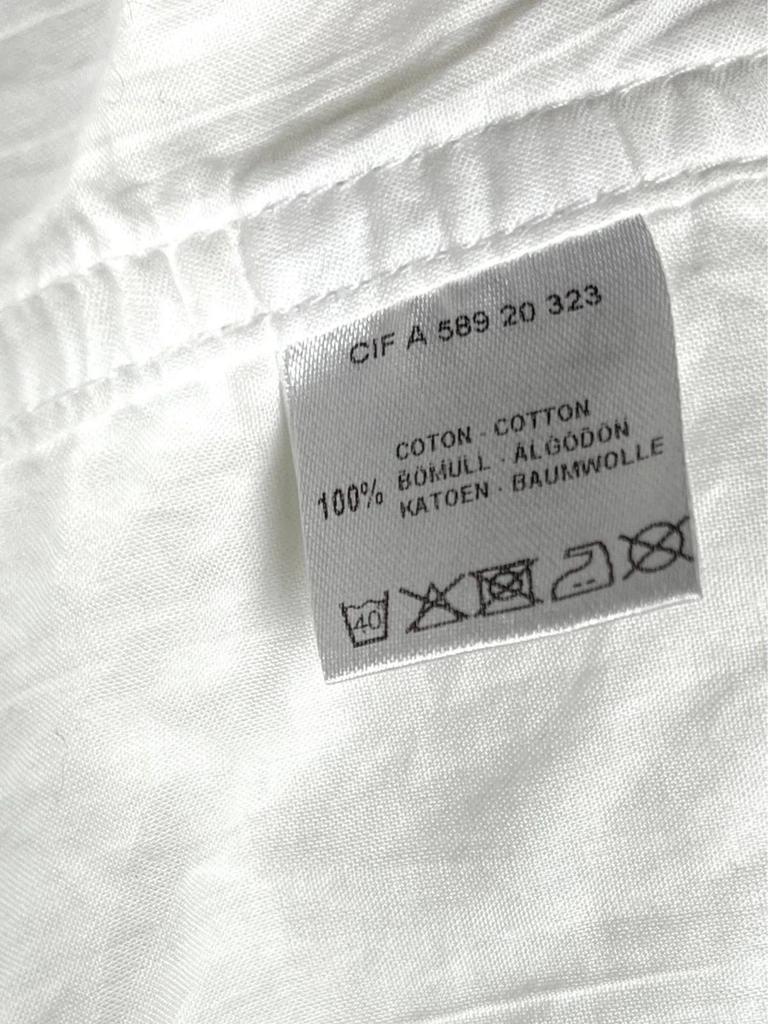 Veste Courrèges blanche à fermeture éclair rouge