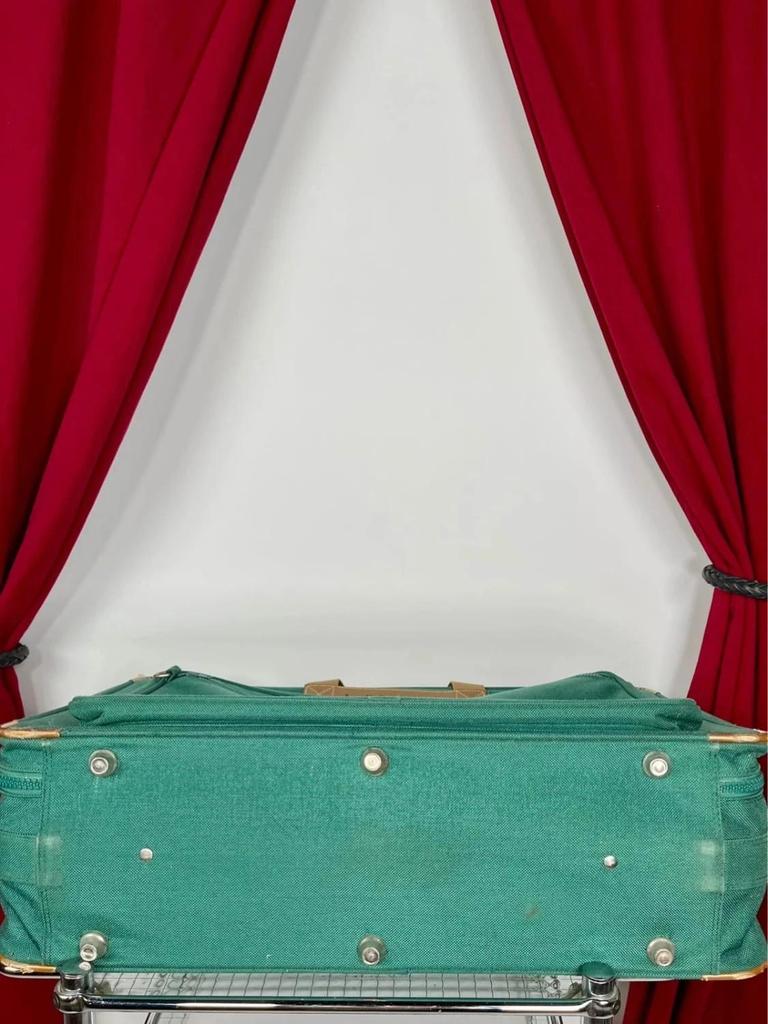 Vintage green Lancel travel bag in fabric and leather