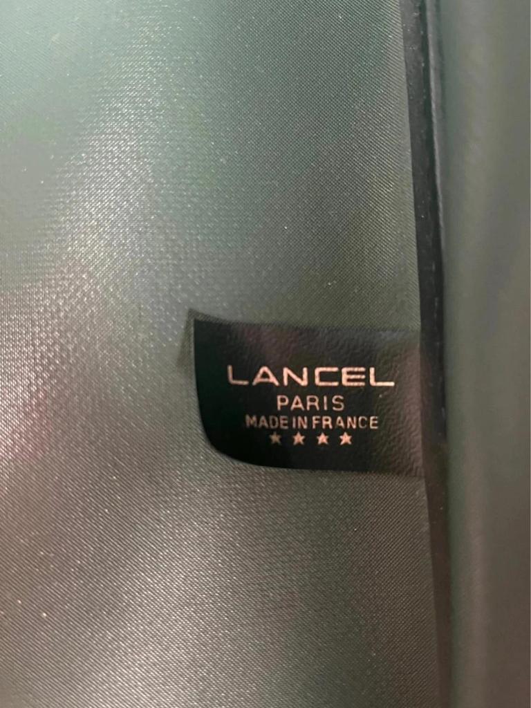 Vintage green Lancel travel bag in fabric and leather