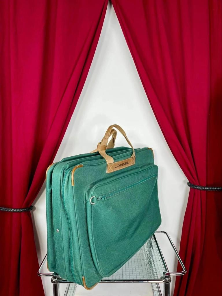 Vintage green Lancel travel bag in fabric and leather