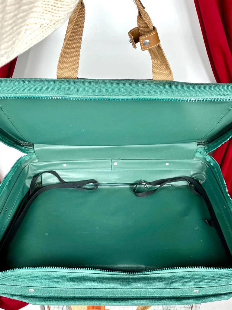 Vintage green Lancel travel bag in fabric and leather