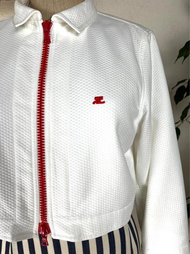 Veste Courrèges blanche à fermeture éclair rouge